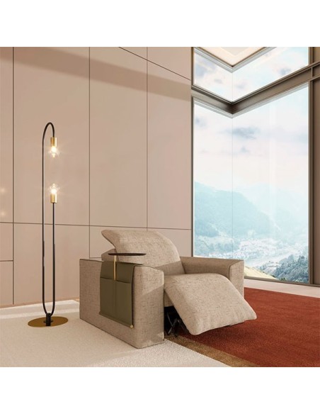 Modelo de sillón reclinable tapizado en tela de Vismara Design