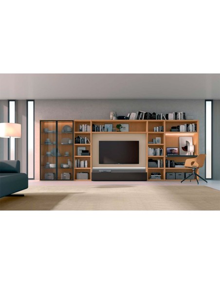 Vista en ambiente de la Composición IOS 06 de Loyra, con librería modular para salón con vitrina y escritorio