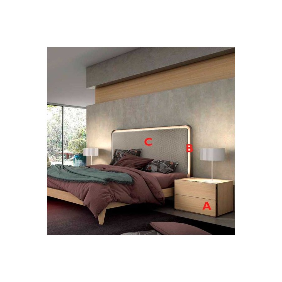 Dormitorio de matrimonio con cabezal tapizado