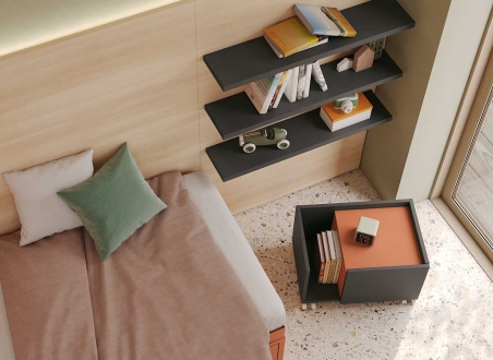 Dormitorio juvenil con estanterías