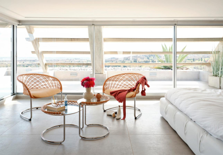 Amiente habitación hotel butacas P47 Lounge Chair