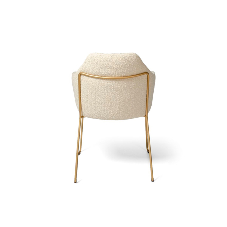 Trasera del sillón Idra MT con pata patín de metal en color oro epoxi y carcasa tapizada en color crudo