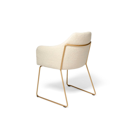 Perfil del sillón Idra MT con pata patín de metal en color oro epoxi y carcasa tapizada en color crudo
