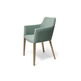 Sillón Hugo con patas de madera y tapizado en tela color verde claro