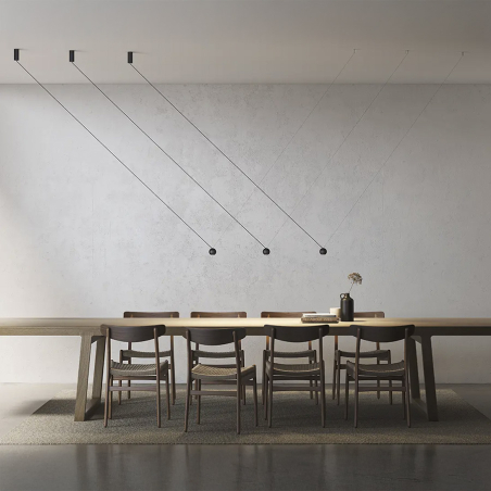 Conjunto de tres Lámparas colgantes Compass en ambiente de salón, de Estiluz