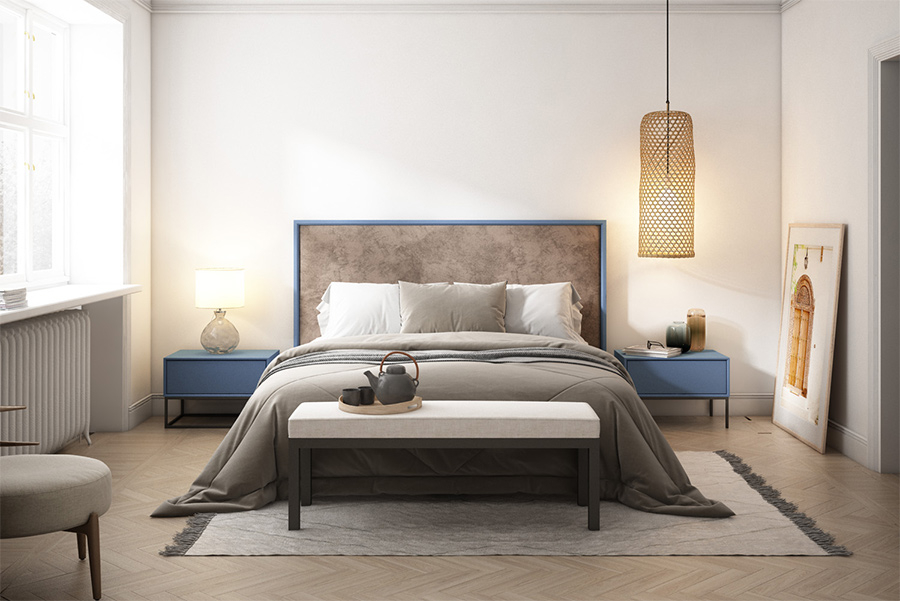 Ambiente de dormitorio Madeira con mesitas de noche y cabezal tapizado