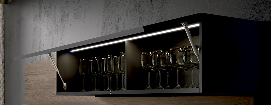 Detalle del módulo vitrina con puerta elevable, con iluminación led y acabado petrol