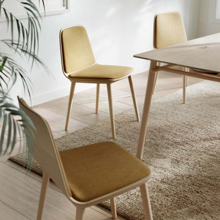 Detalle del asiento tapizado de la Silla Bisell de Treku
