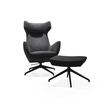 Butaca T-Visión de la firma italiana de diseño Twils en acabado gris oscuro con reposapiés a juego.