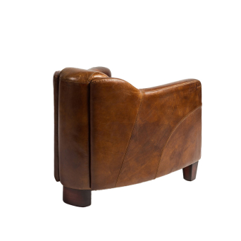 Sillón en piel de vaca envejecida color cigar, de Crisal Decoración 2
