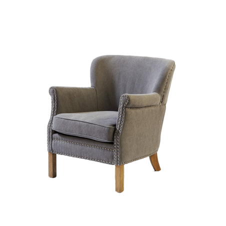 Sillón de lino gris con tachuelas y patas de madera de Crisal Decoración