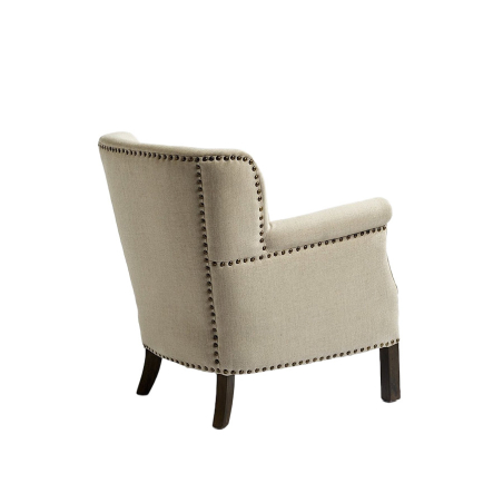Vista lateral trasera del Sillón lino con tachuelas de Crisal Decoración