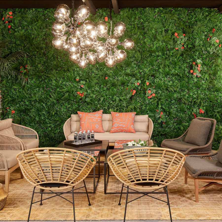 Sillón redondo de ratán de Crisal Decoración integrado en ambiente