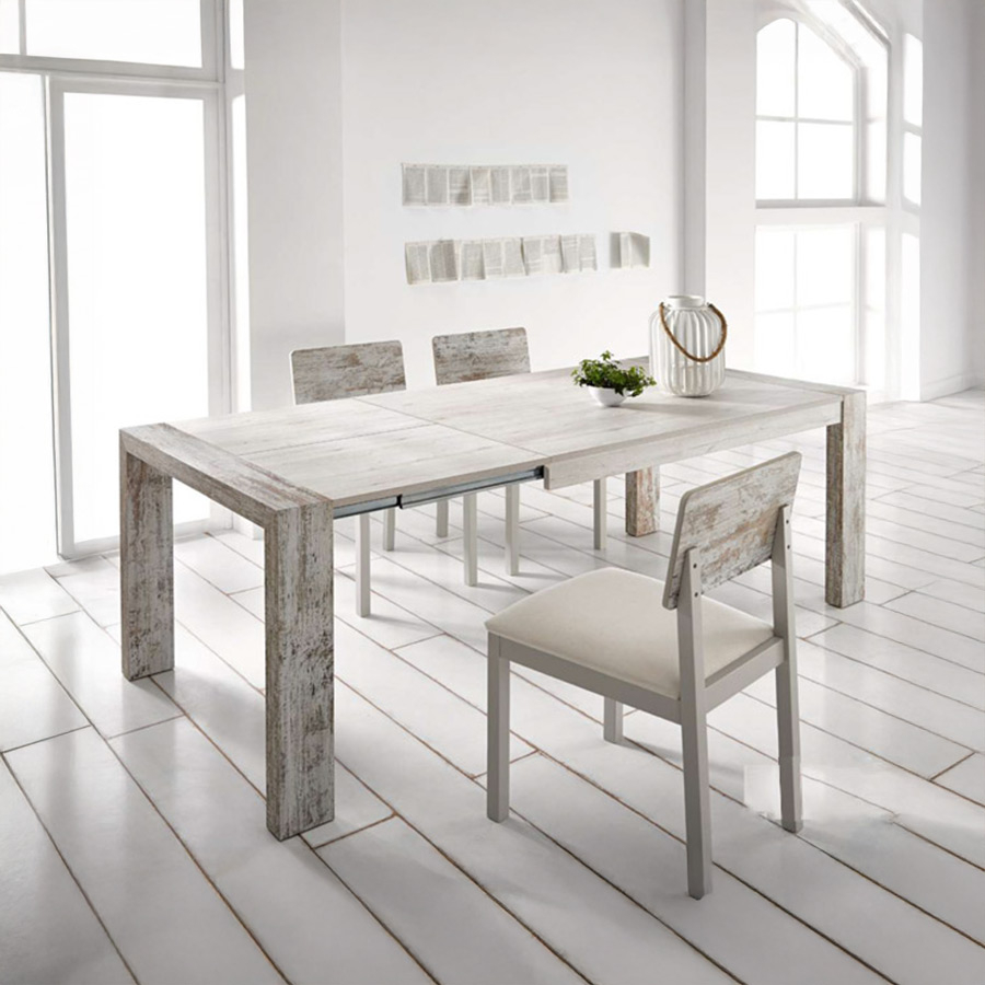 Mesa extensible de comedor Évora de Pemi Mobiliario fabricada en melamina y vista de ambiente de estilo rústico.