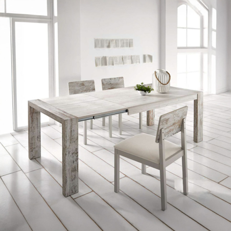 Mesa extensible de comedor Évora de Pemi Mobiliario fabricada en melamina y vista de ambiente de estilo rústico.