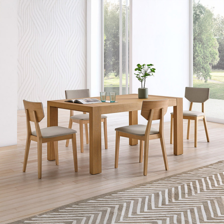 Mesa extensible de comedor Évora de Pemi fabricada en melamina y vista de ambiente extendida con sillas modelo domus.