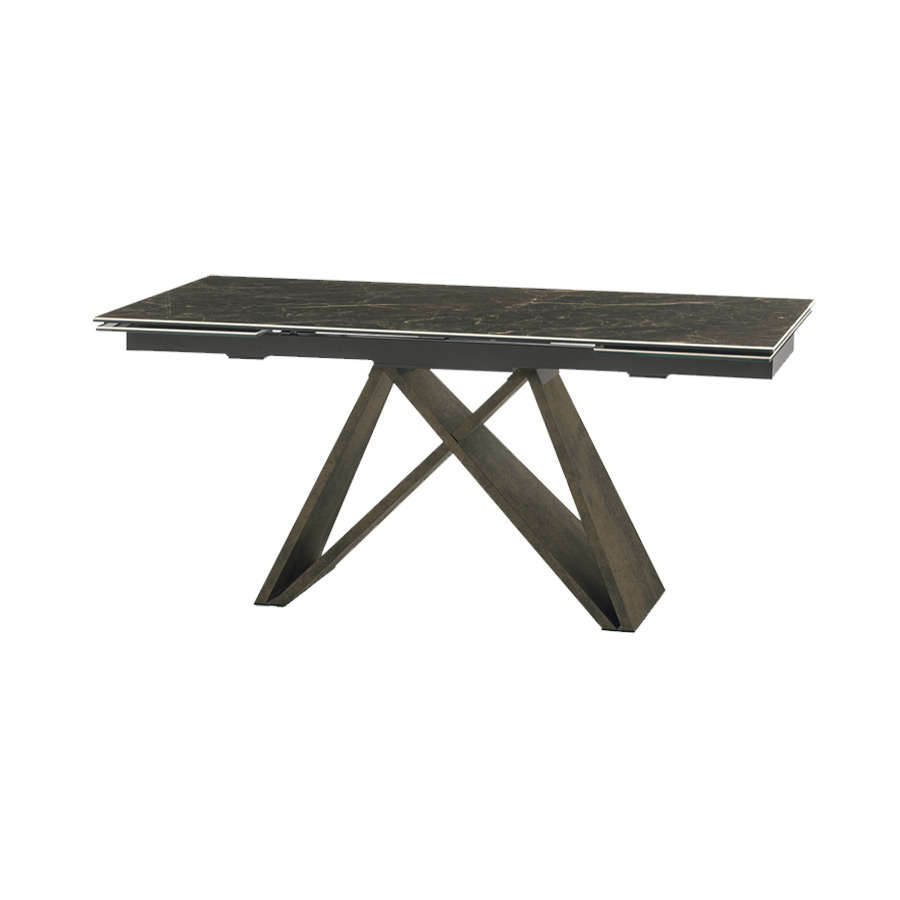 Mesa extensible Delta de la firma italiana Target Point, en acabado sobre emperador y patas bronce.