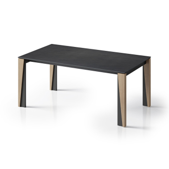 Mesa extensibl  Eden de la firma portuguesa Tabula en acabado Vulcan con detalles de pata en roble.
