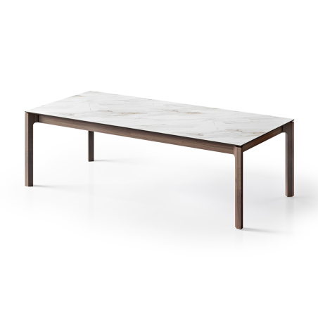 Mesa extensible Mercury de la firma portuguesa Tabula con tapa cerámica y patas en nogal