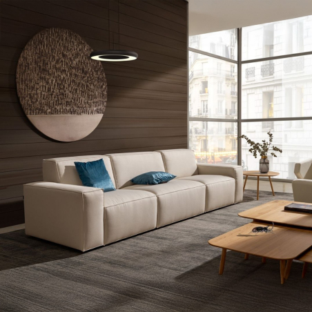 Sofá Cool de la firma Frajumar compuestos por 3 módulos y tapizado color crema en vista de ambiente.