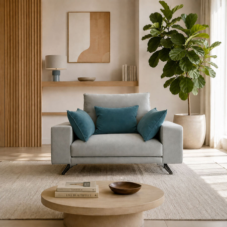 Sofá individual modelo Arcos en salón con un estilo y decoración contemporáneo y ambiente relajante.